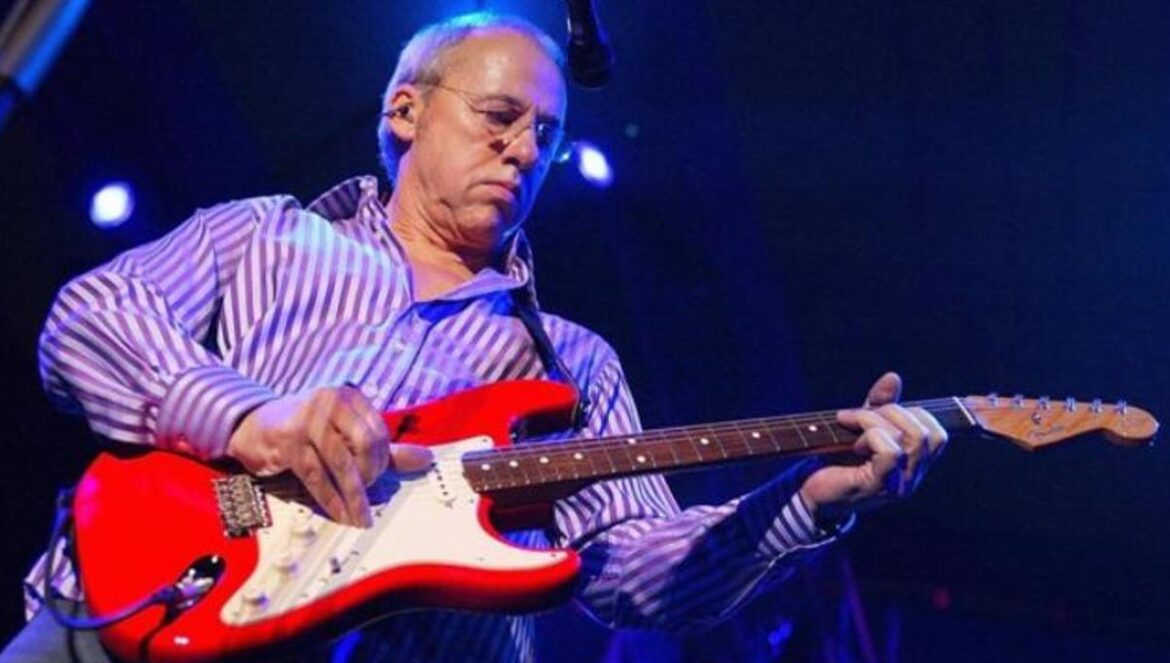 Mark Knopfler.