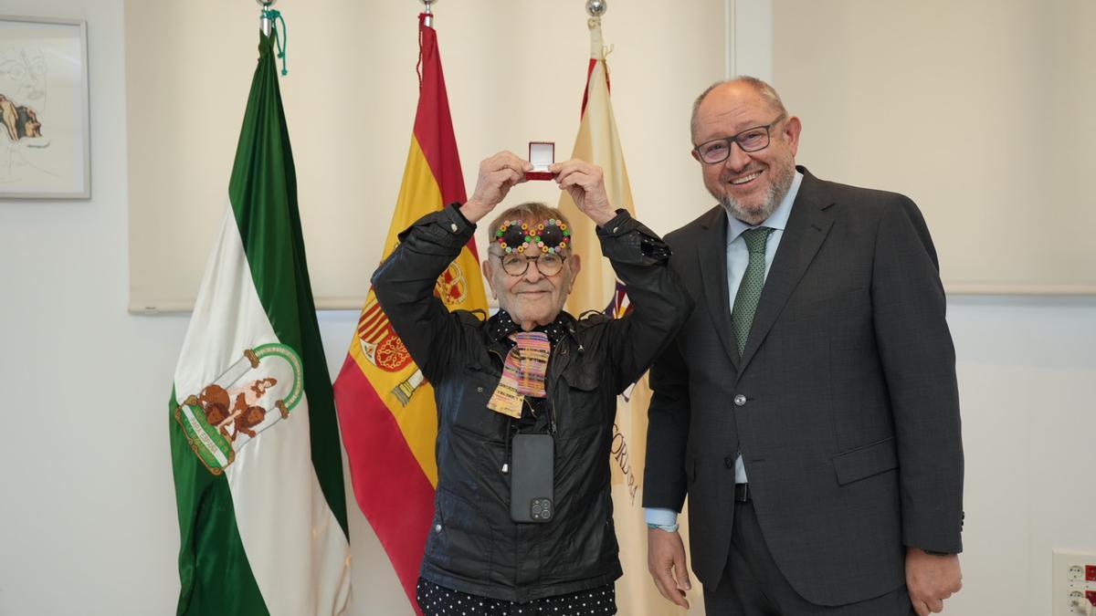 Arrabal junto al rector.