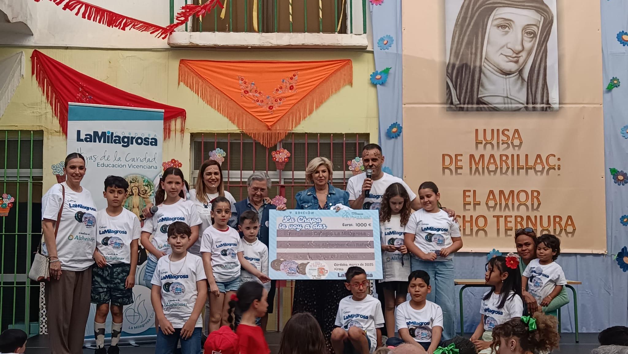 Acto de entrega del cheque a la Asociación Alzheimer Córdoba / Colegio La Milagrosa