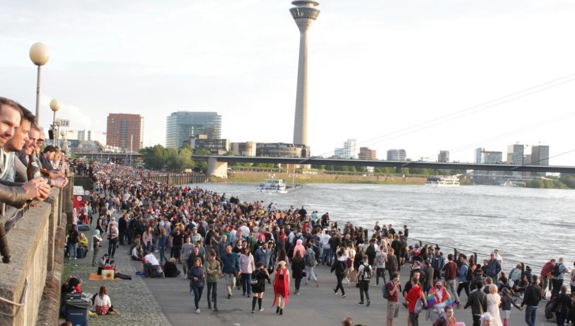 crowd of people near body of water