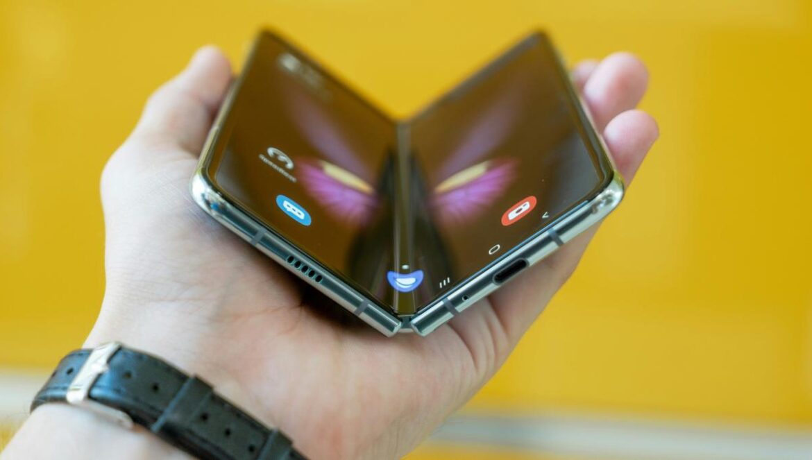 person holding black phone