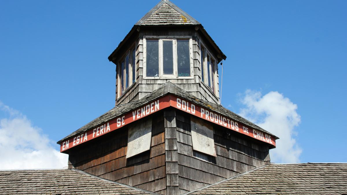 brown and gray concrete building under blue sky during daytime