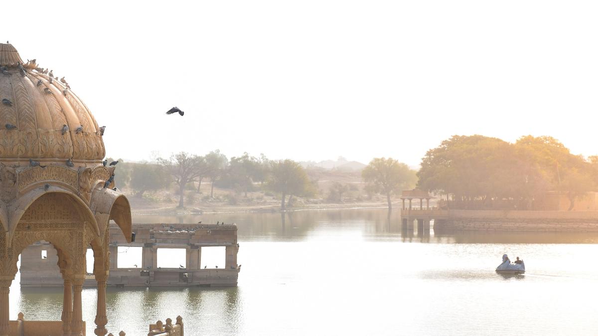 body of water near bridge during daytime