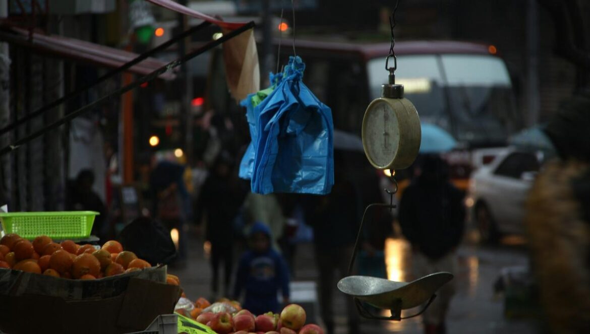 fruit stand on the street during night time
