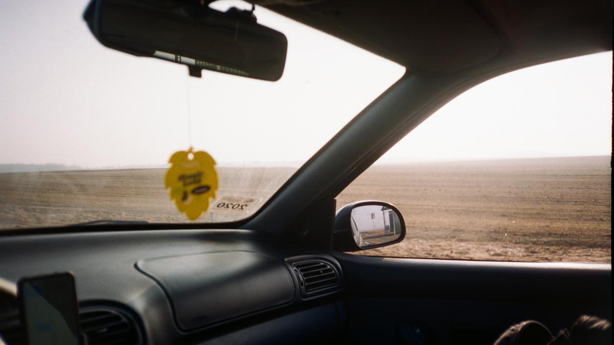 yellow car on road during daytime