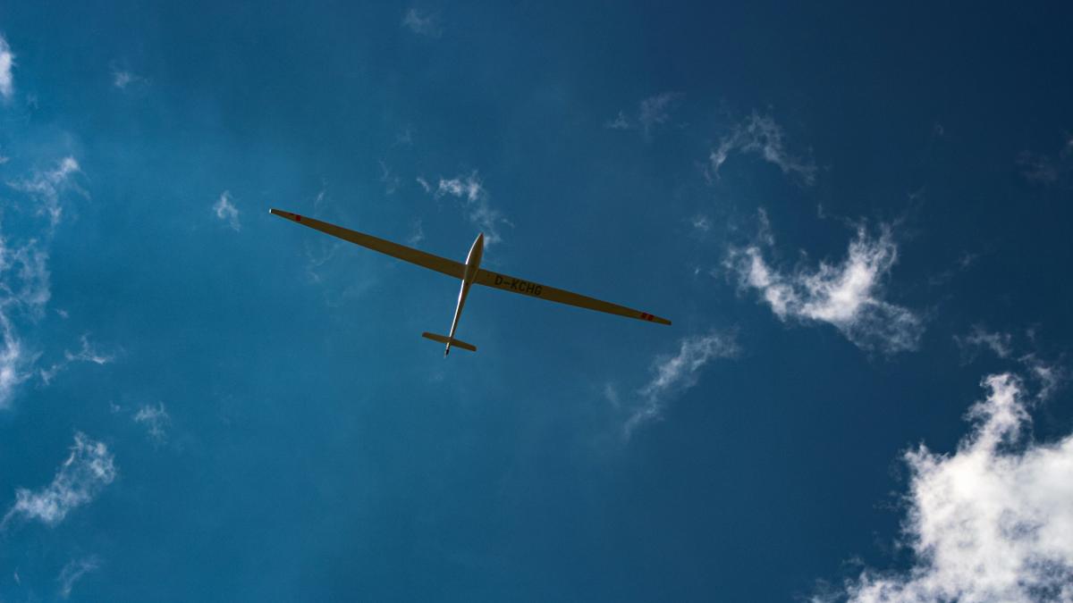 orange plane in the sky