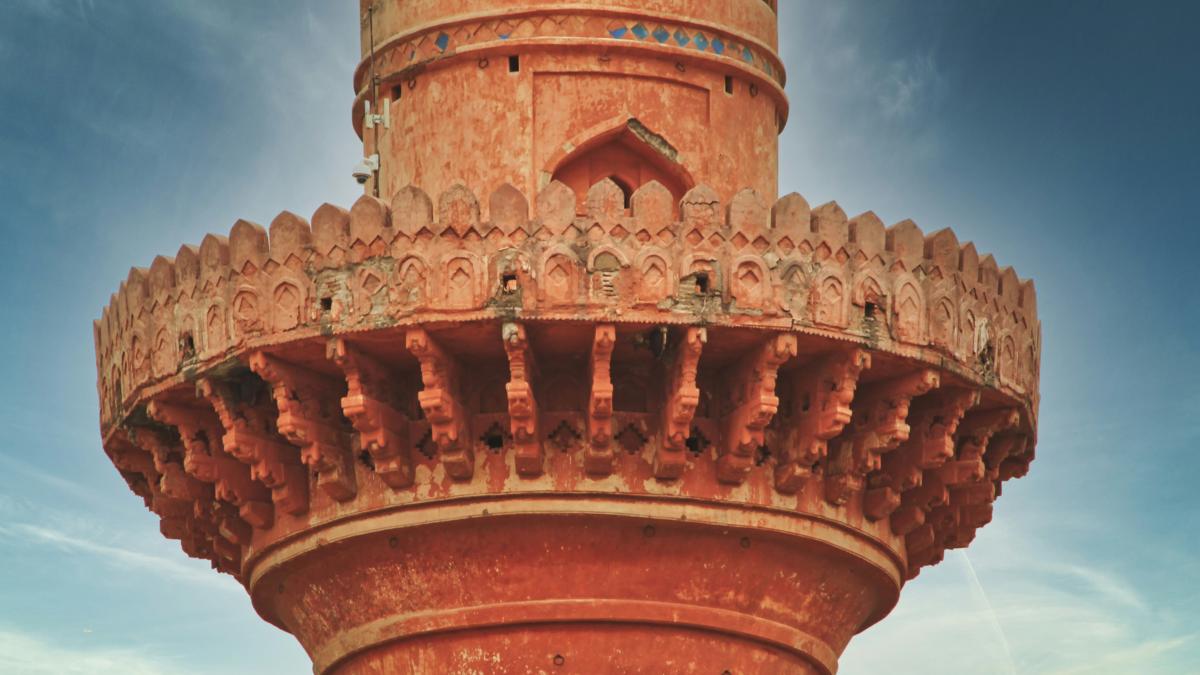 brown concrete tower under blue sky during daytime