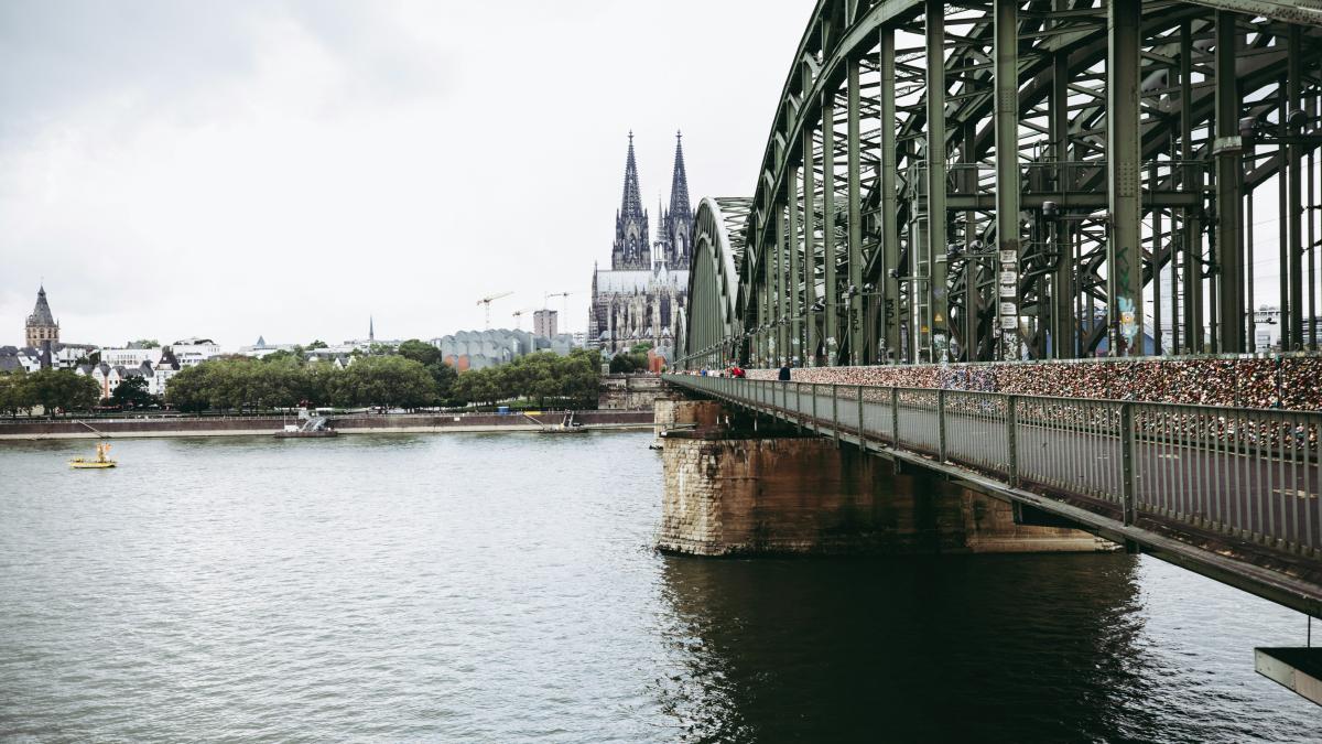 gray metal bridge over river during daytime