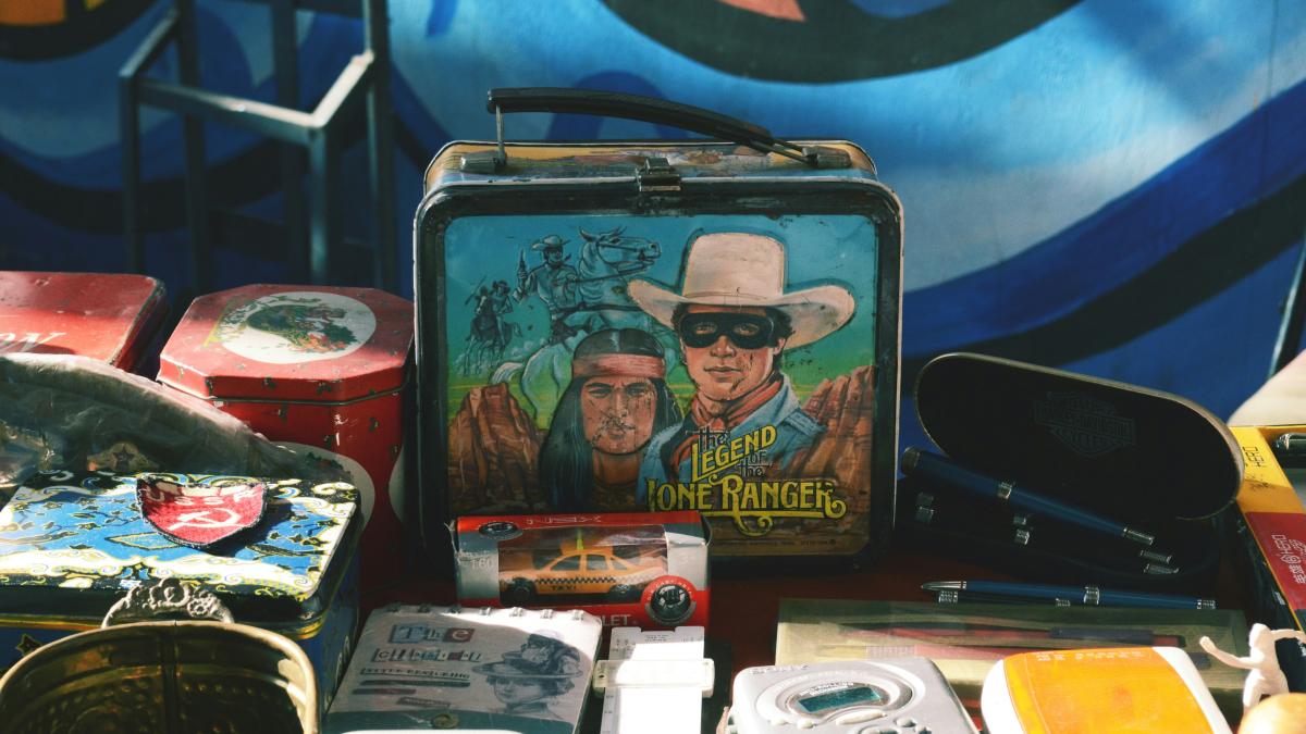 a suitcase with a picture of two men on it