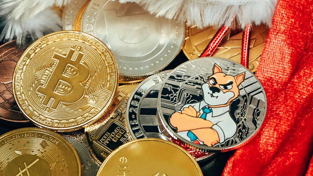 a pile of bitcoins sitting on top of a red blanket
