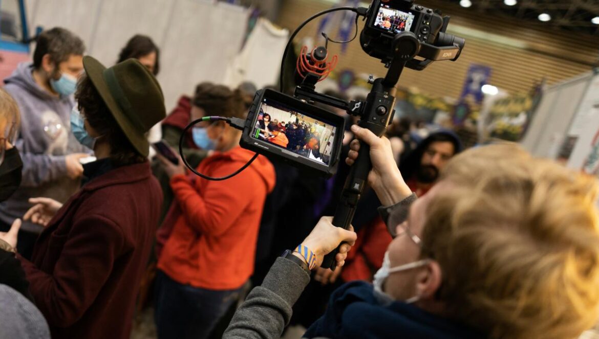 a person holding a camera