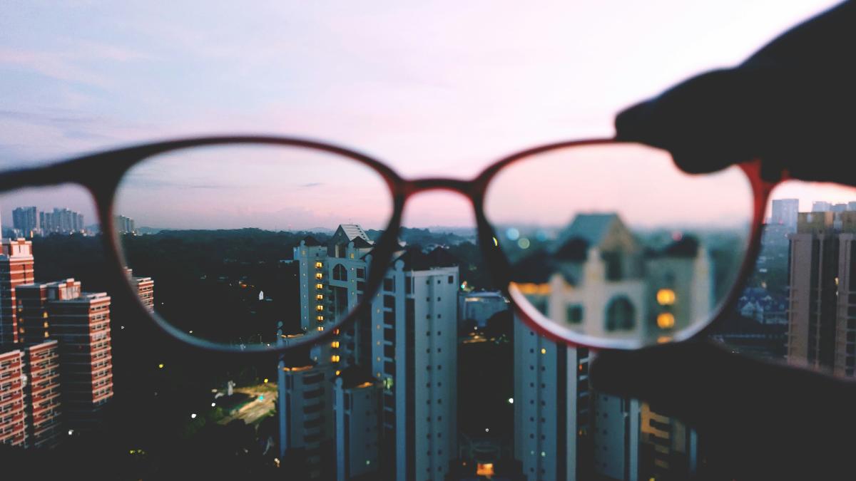 a pair of sunglasses on a city street