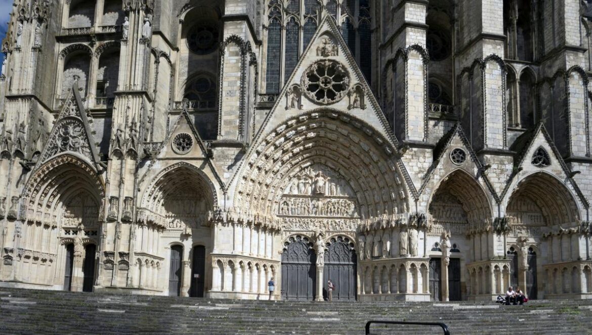 a large stone building with many arches
