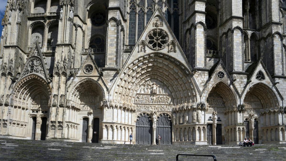 a large stone building with many arches