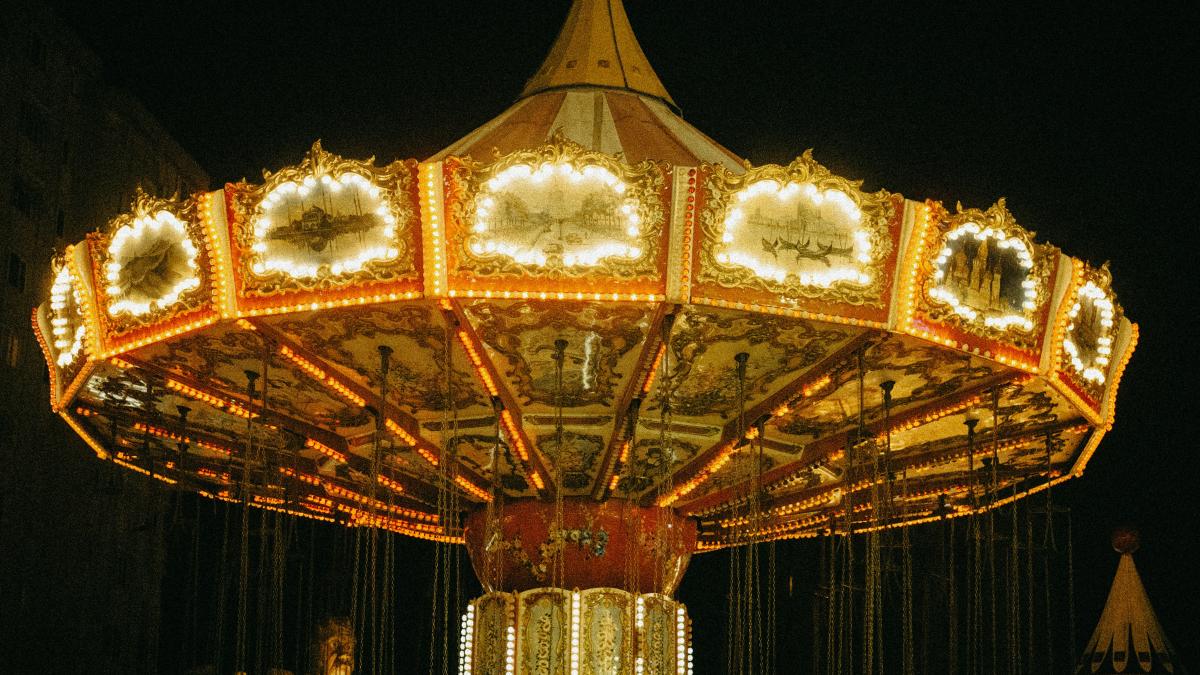 a merry go round at night with lights