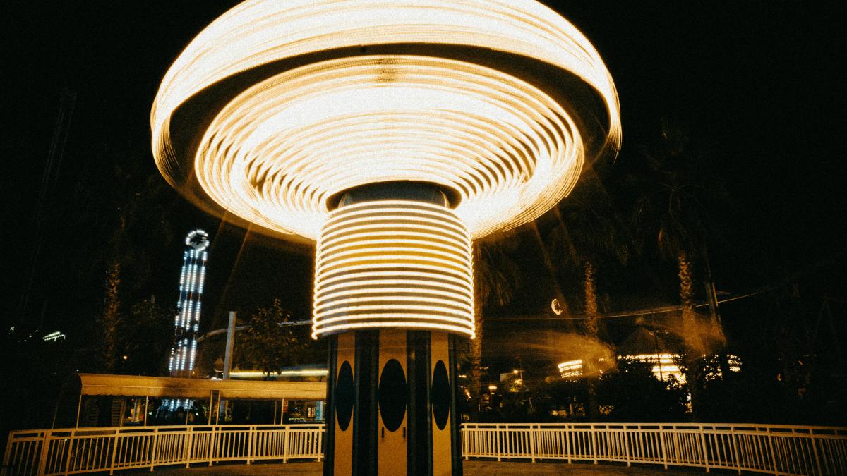 a merry go round at night in a park