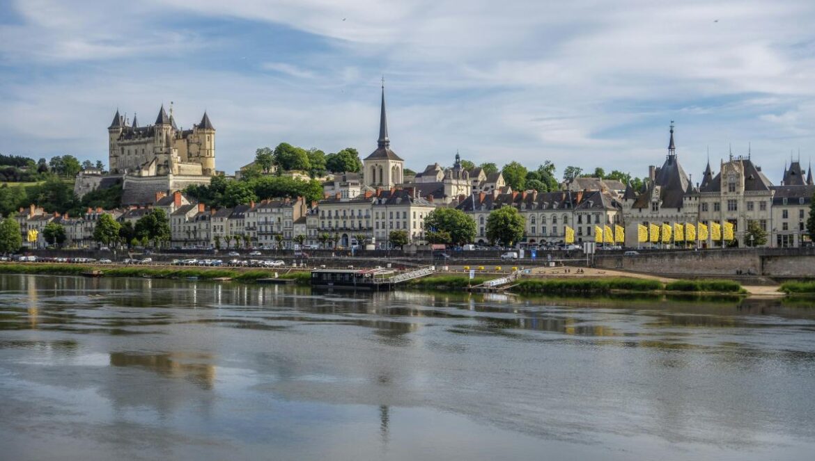 a river with a city in the background