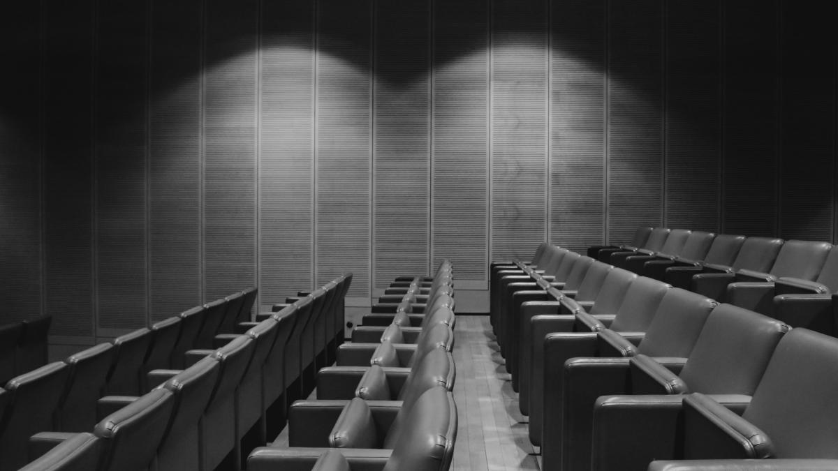 a row of empty seats in a theater