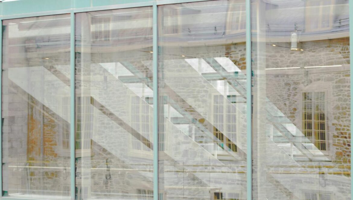 a building with a bunch of windows and a clock