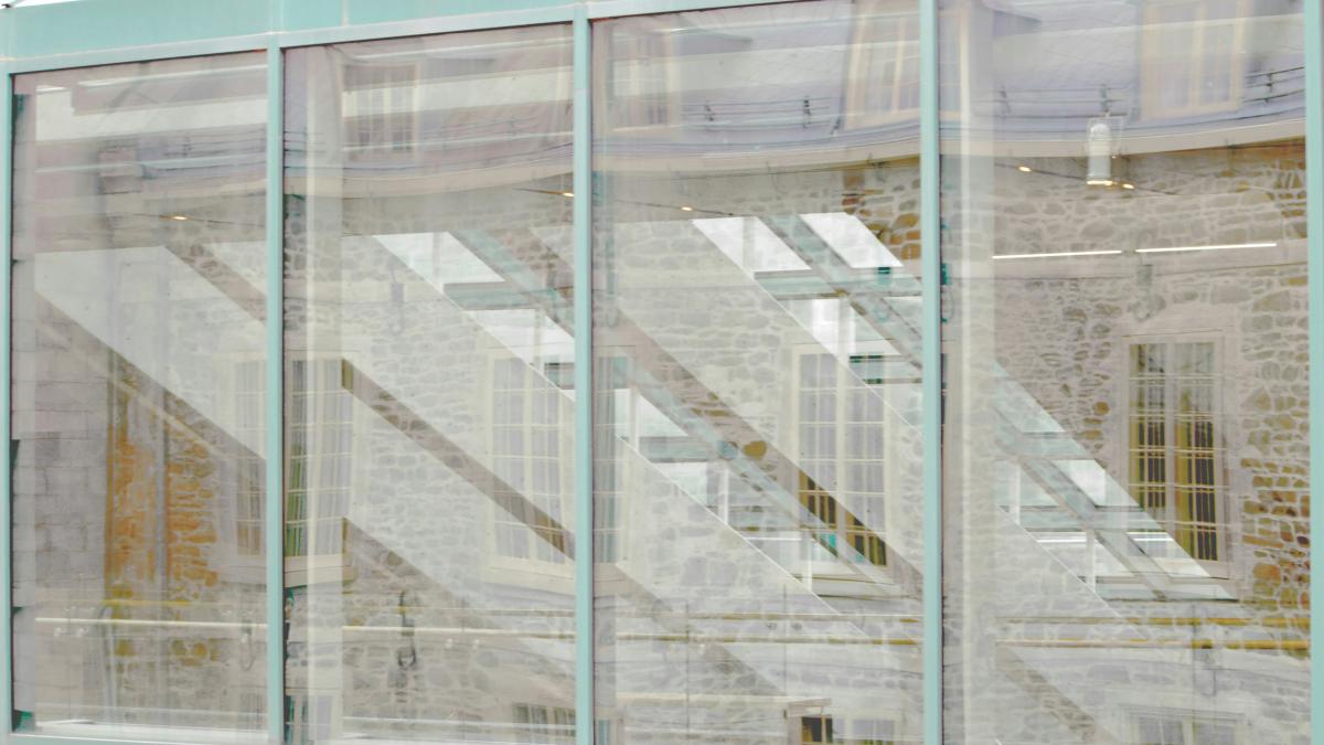 a building with a bunch of windows and a clock