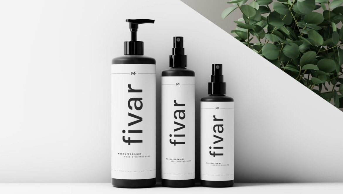 a couple of bottles that are next to a plant