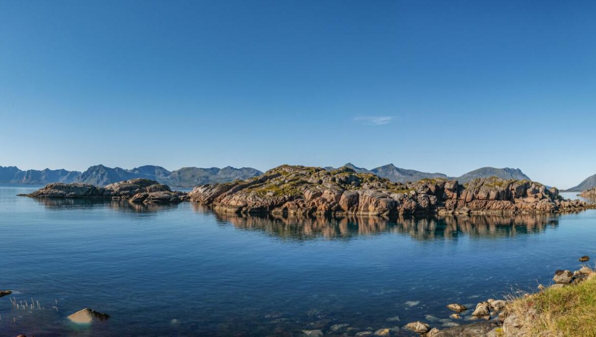 a large body of water surrounded by mountains