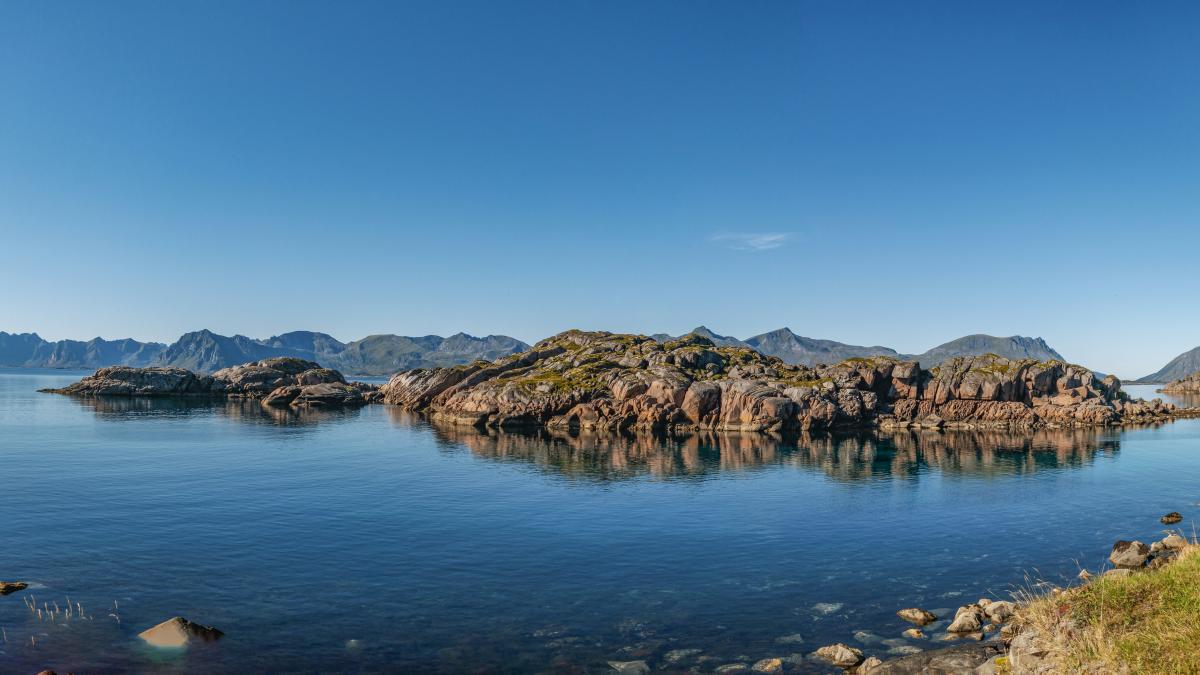 a large body of water surrounded by mountains