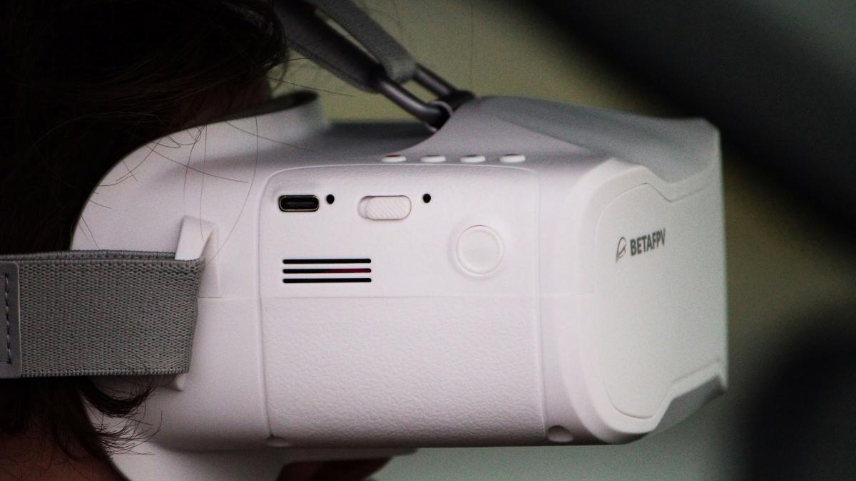 a close up of a person wearing a camera