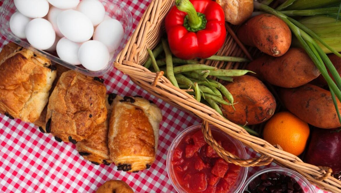 a table topped with baskets filled with food