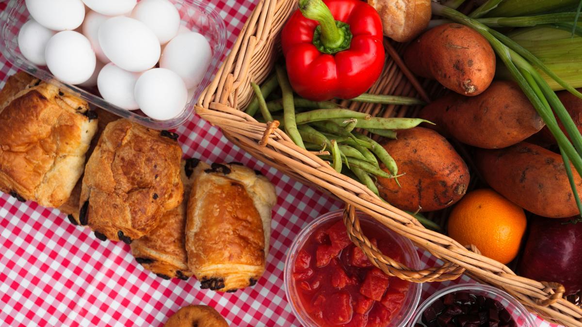 a table topped with baskets filled with food