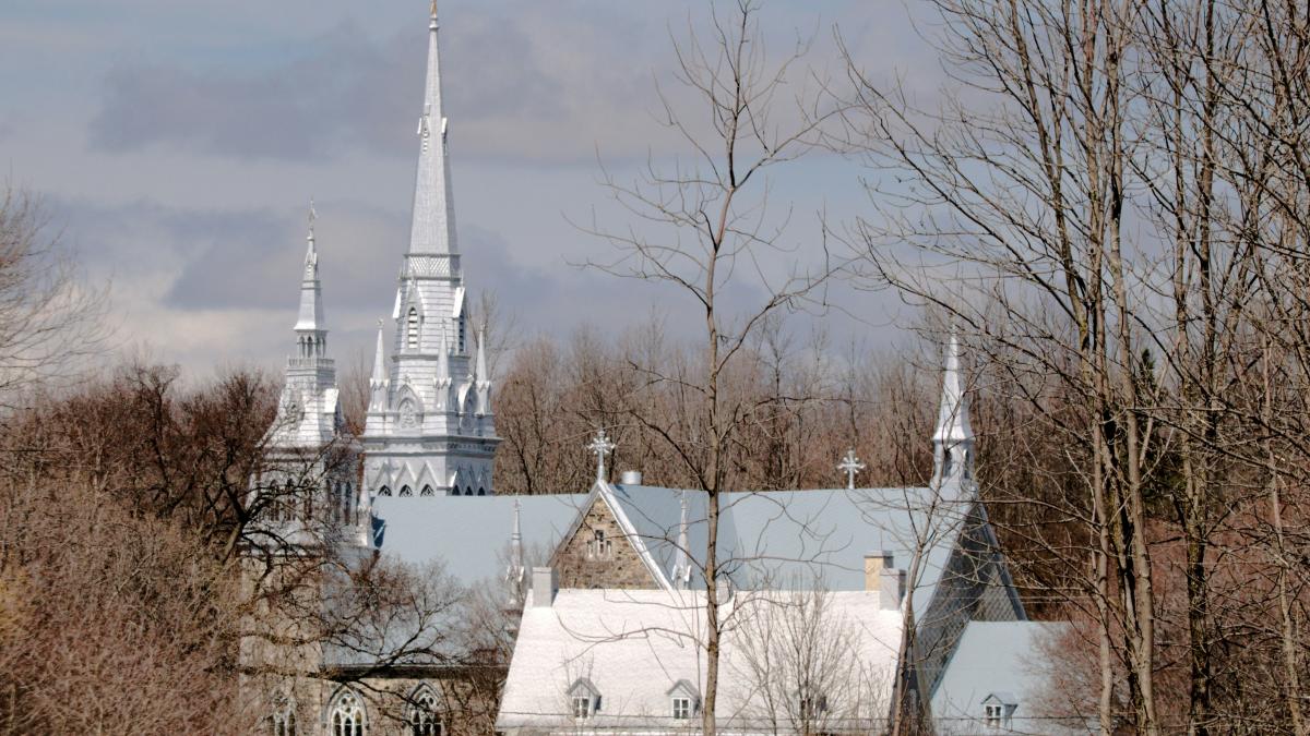 a church with a steeple in the background