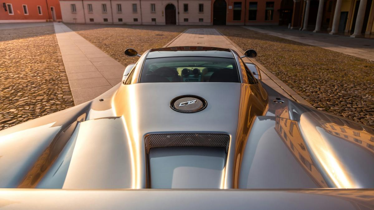 A car is parked on the side of a road