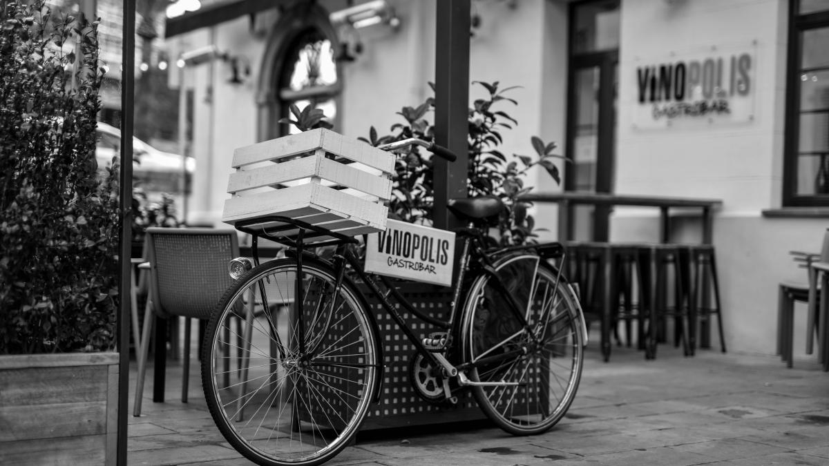 grayscale photo of a city bicycle