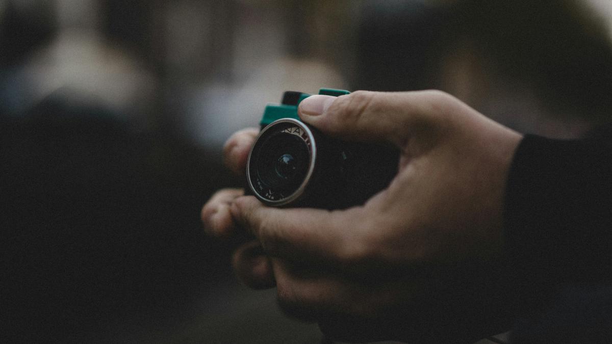 person holding camera