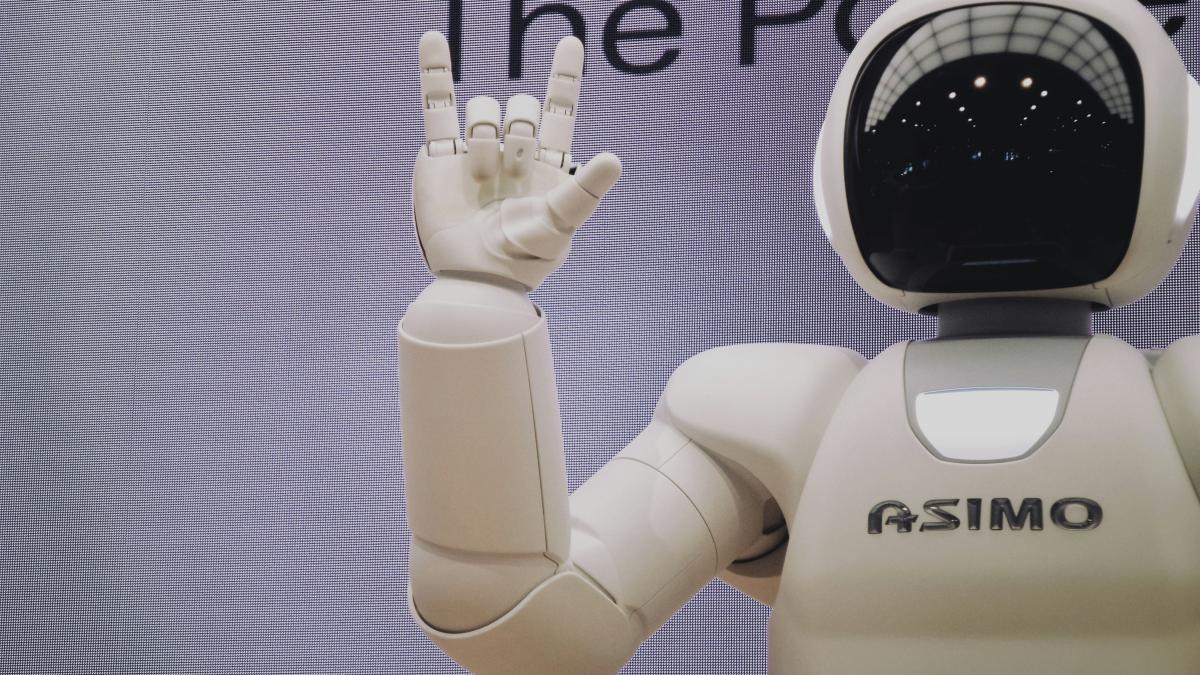 Asimo robot doing handsign