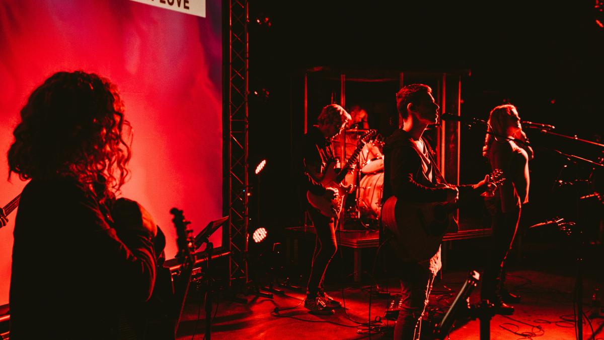 group of people performing on stage