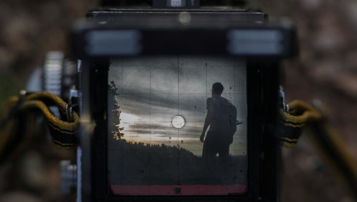 selective focus photography of black camera