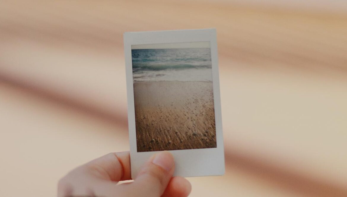 person holding film photo