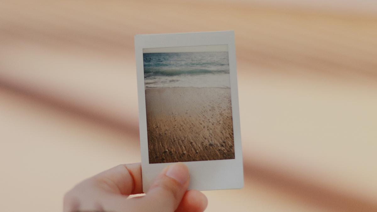 person holding film photo