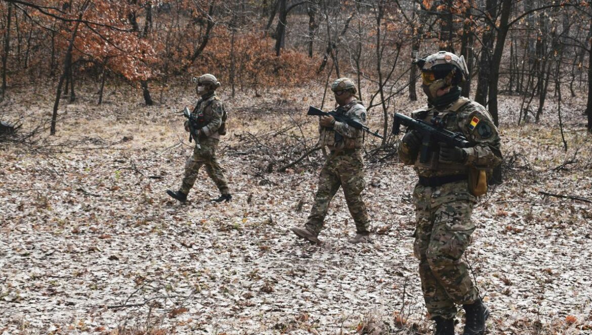 three soldiers at the forest