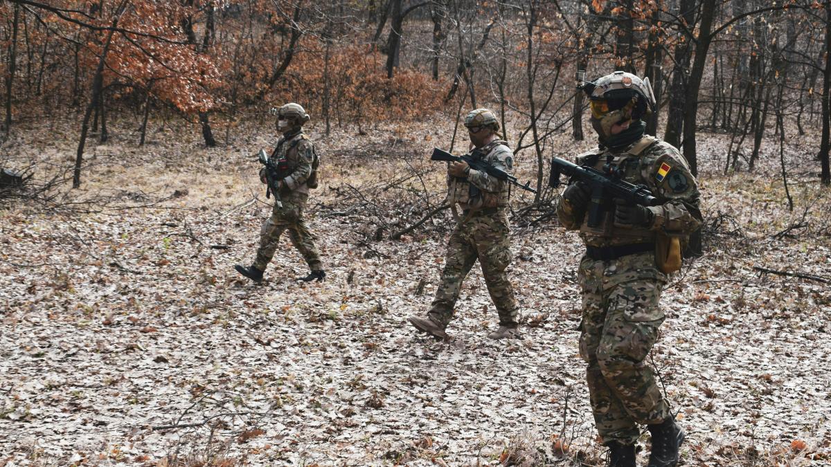 three soldiers at the forest
