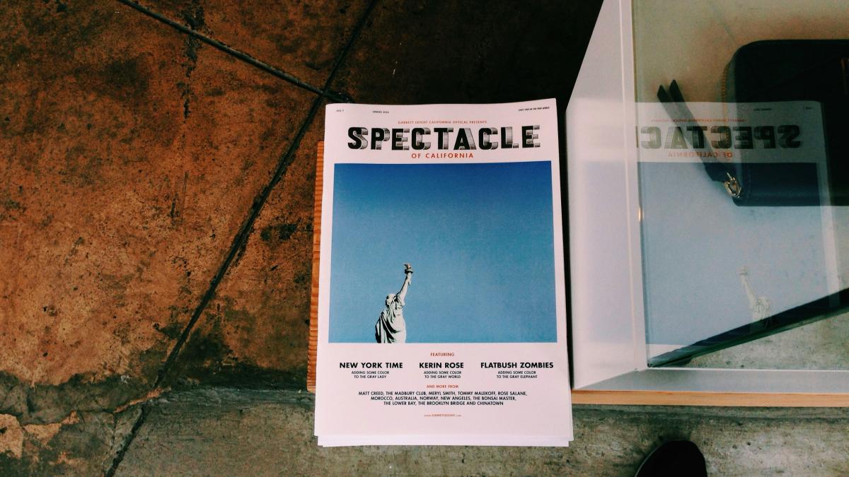 Spectacle book on brown surface