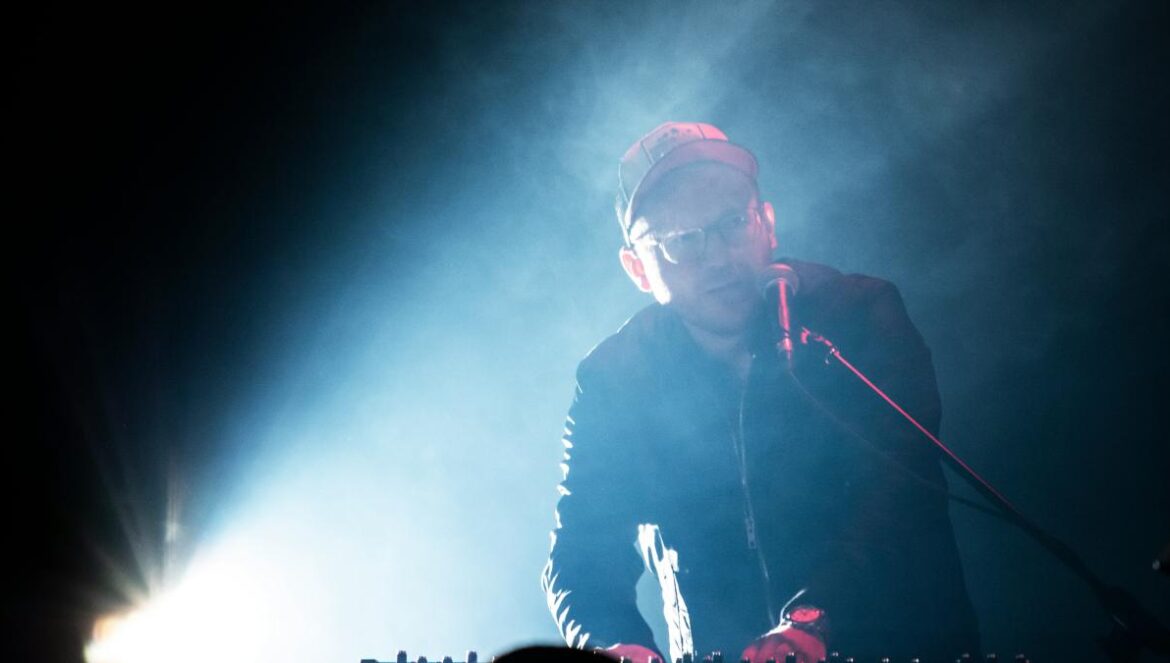 man playing electronic keyboard
