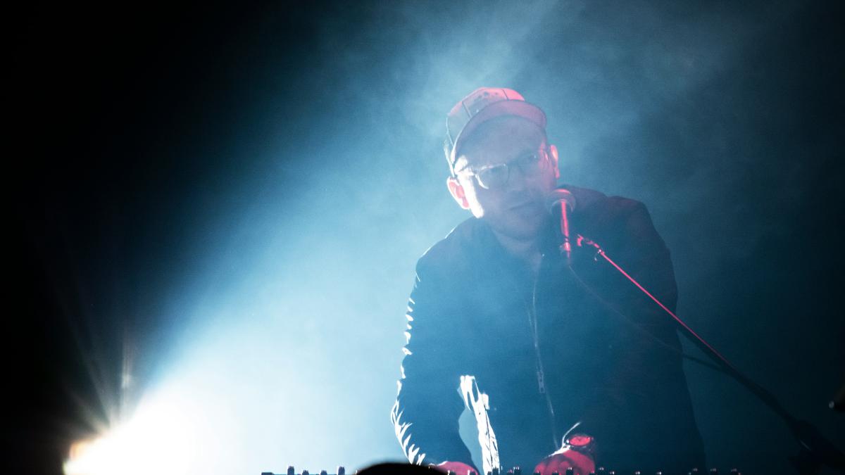 man playing electronic keyboard