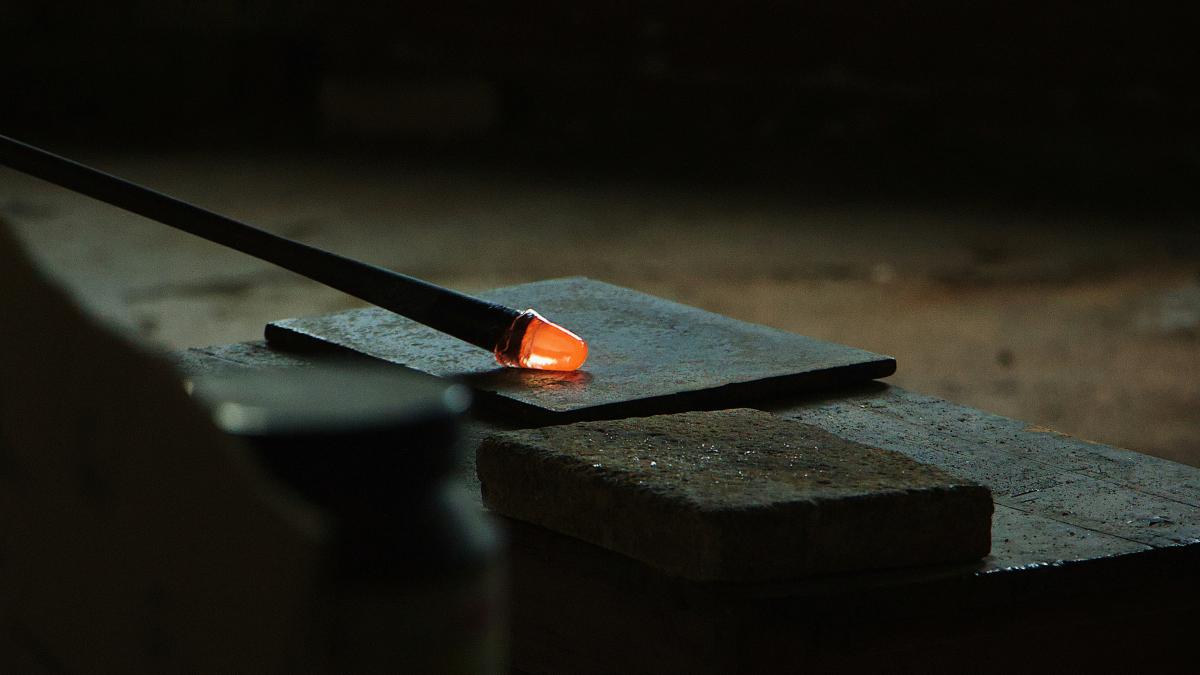 black rod with red on top