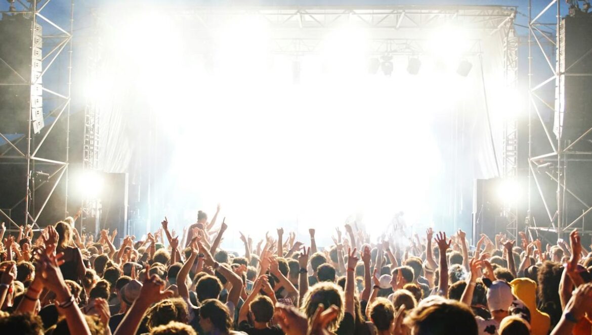 people standing beside stage