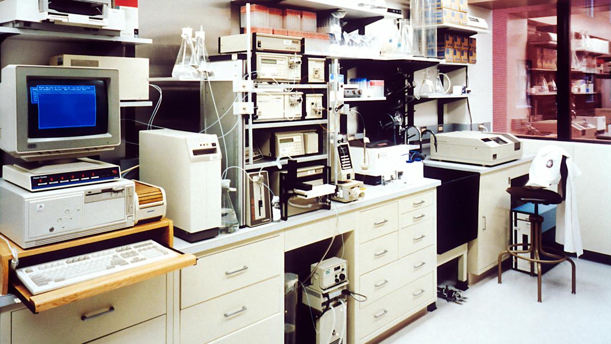 desktop monitor beside computer tower on inside room