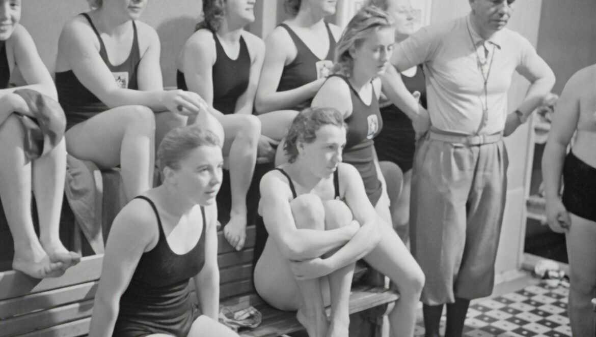 grayscale photography of women in monokinis