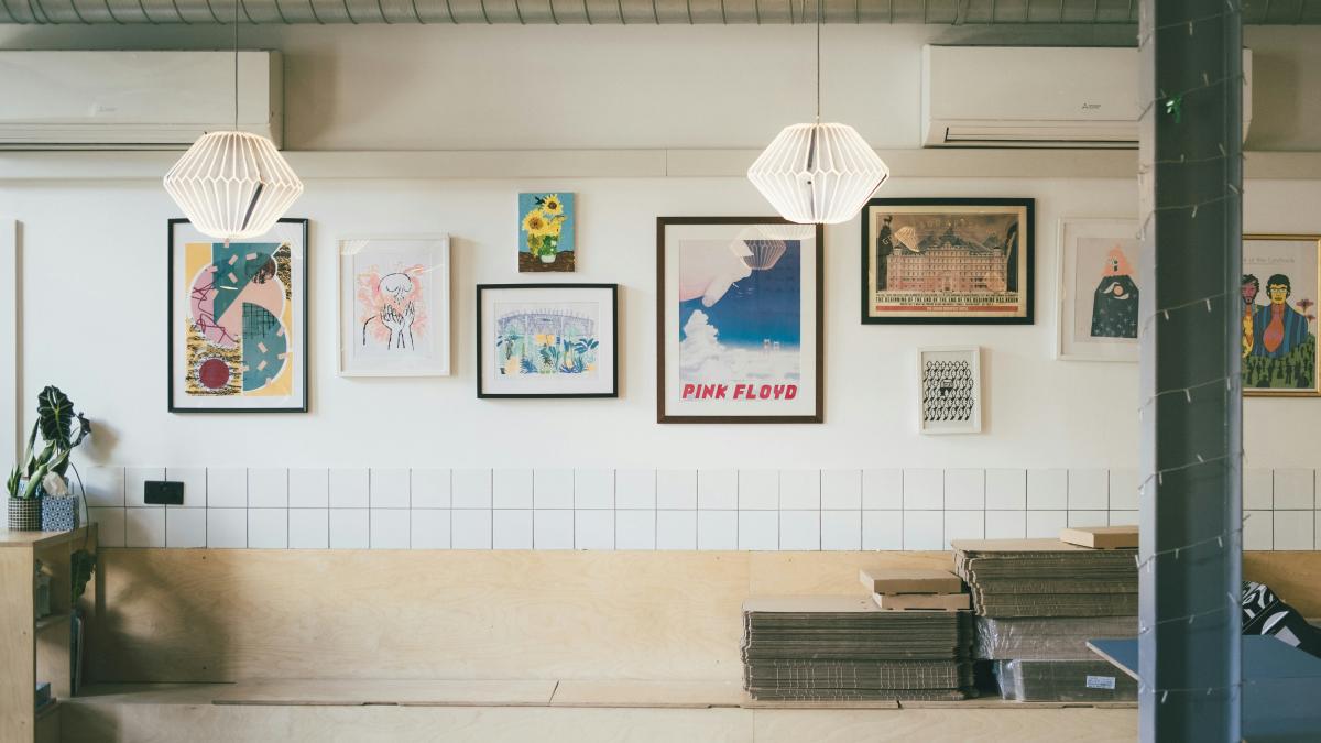 white and blue abstract painting on white wall