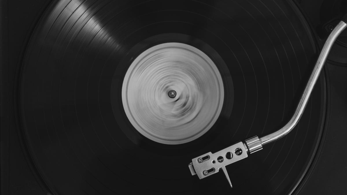 black vinyl record on vinyl record